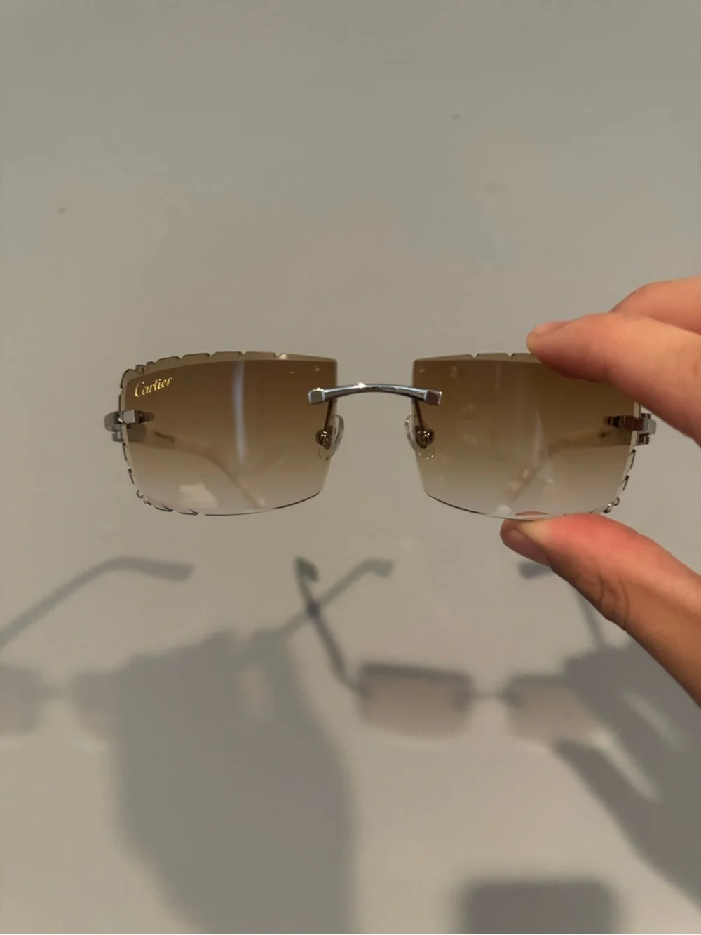 Cartier Men’s Rimless Sunglasses in Brown Gradient with Silver Bridge